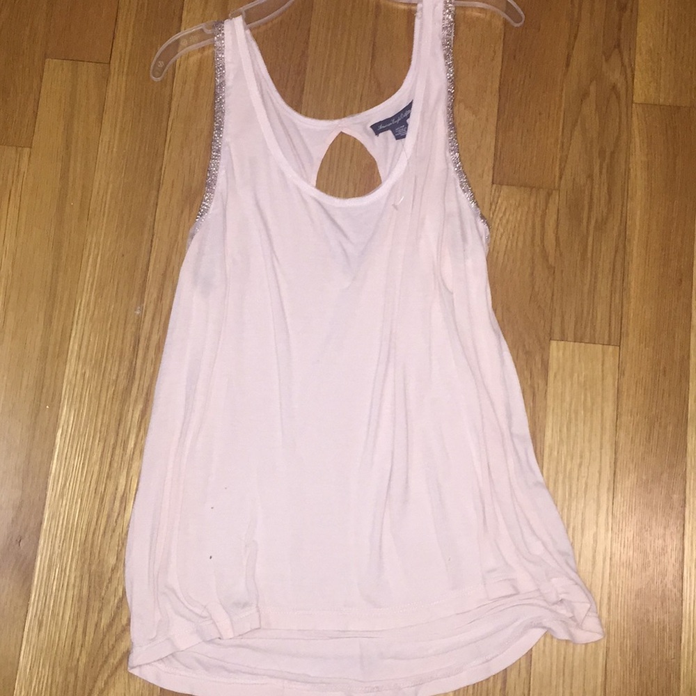 Blush pink flowy tank with beads on the sides
